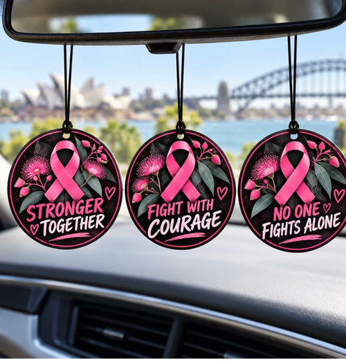 Three pink ribbon car air freshener designs: Stronger Together, Fight With Courage and No One Fights Alone